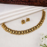Antique Gold Beaded Elakkathali Choker Necklace Set with matching earrings displayed elegantly.