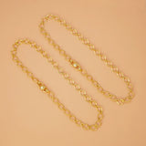 झनझनाते सोने की परत चढ़े घुंघरू के आकर्षण वाले मनके वाले पायल