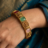 Antique Gold Plated Lakshmi Sufi Pastel Stone Bangle showcasing rectangular pastel stones and Goddess Lakshmi.