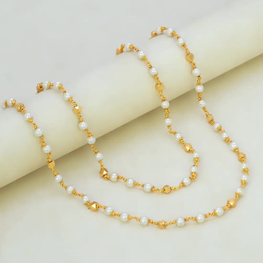 Gold Plated Big Pearl And Golden Beads Mala Chain featuring shiny white pearls and golden beads on a delicate link chain.