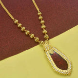 Premium Gold Plated Ball Necklace With Nagapadam Pendant highlighting a striking red gemstone and intricate design.