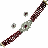 Elegant Multi-Strand Crystal American Diamond Choker Set featuring maroon crystals and intricate design.