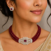 Elegant Multi-Strand Crystal American Diamond Choker Set worn with matching earrings, featuring maroon crystals.
