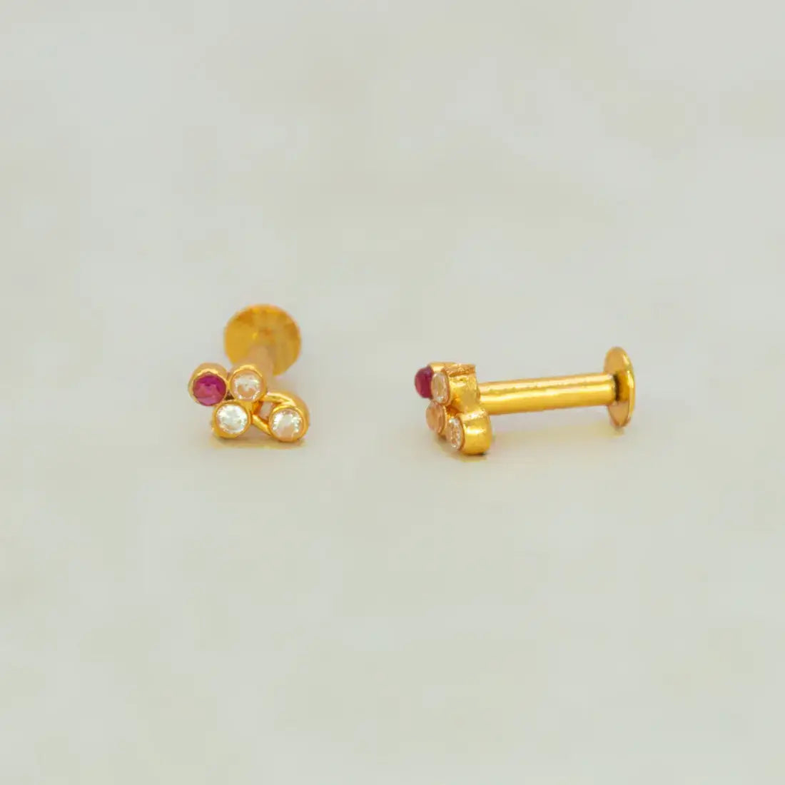 Cute Stone Studs for Second Lobe, featuring a floral design with sparkling stones in gold plating.