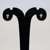 Cute Stone Studs for Second Lobe displayed on a stand with a floral design and sparkling stones.