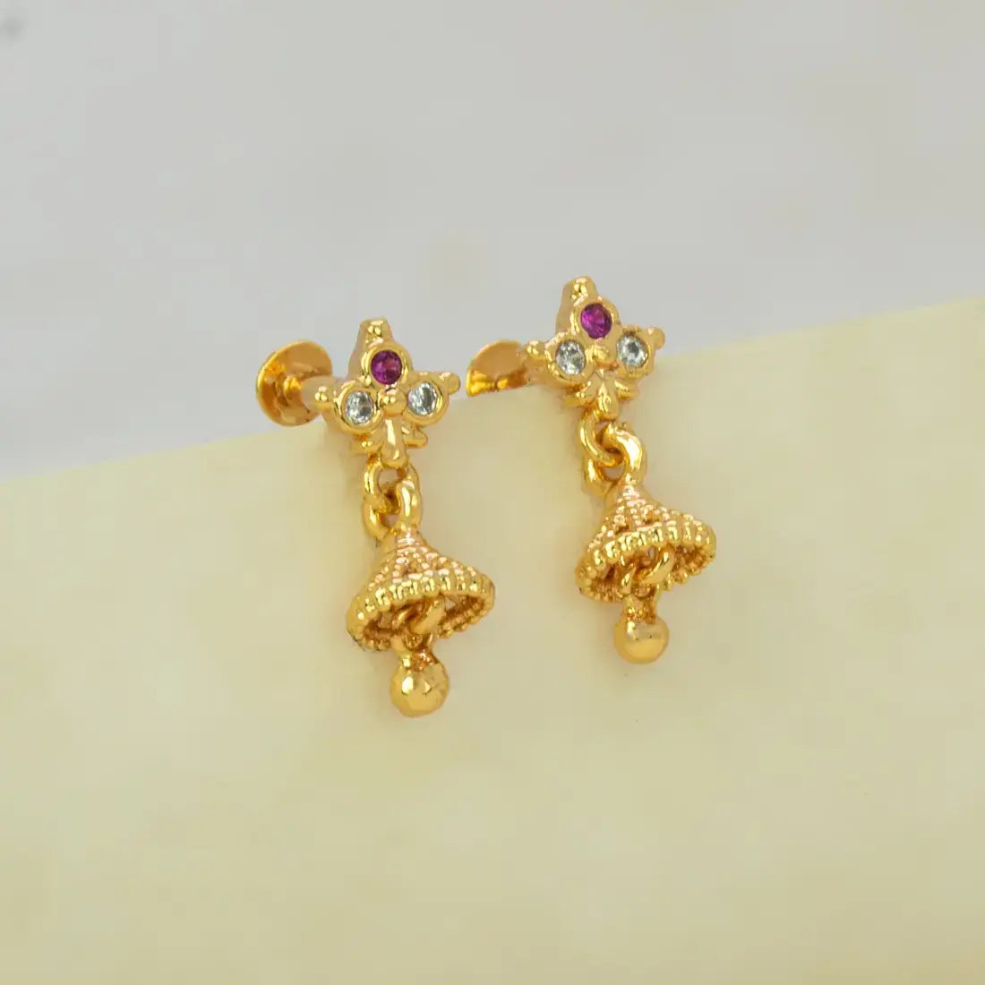 Ruby CZ Stone Small Kids Jhumka - delicate gold floral stud with ruby centre stone and jhumka bell.