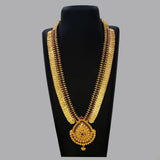 Gold-Plated Stone Lakshmi Kasu Haram Necklace displayed on a black bust, showcasing its intricate design and large pendant.