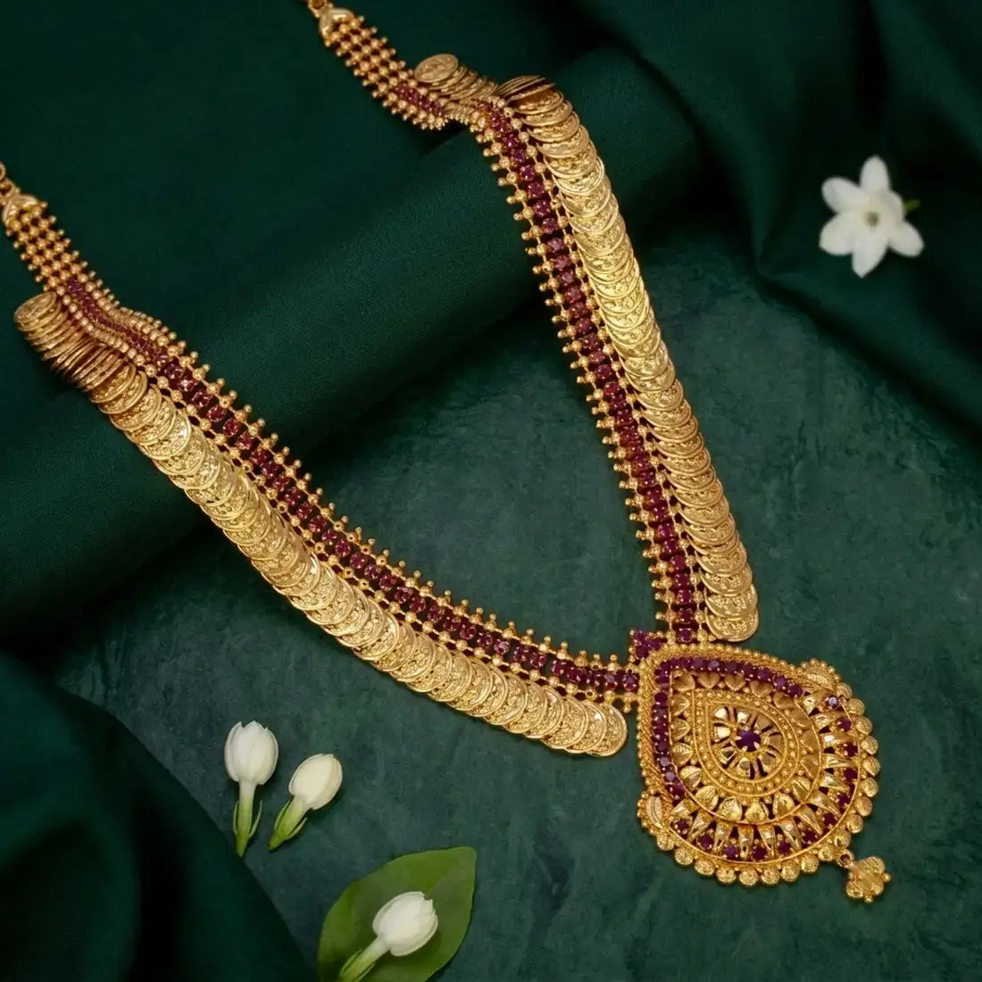Gold-Plated Stone Lakshmi Kasu Haram Necklace featuring gold discs and a teardrop-shaped pendant.