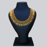 Gold Plated Jasmine Bud Ruby Stone Necklace displayed on a black bust, featuring pointed gold shapes and ruby stones.