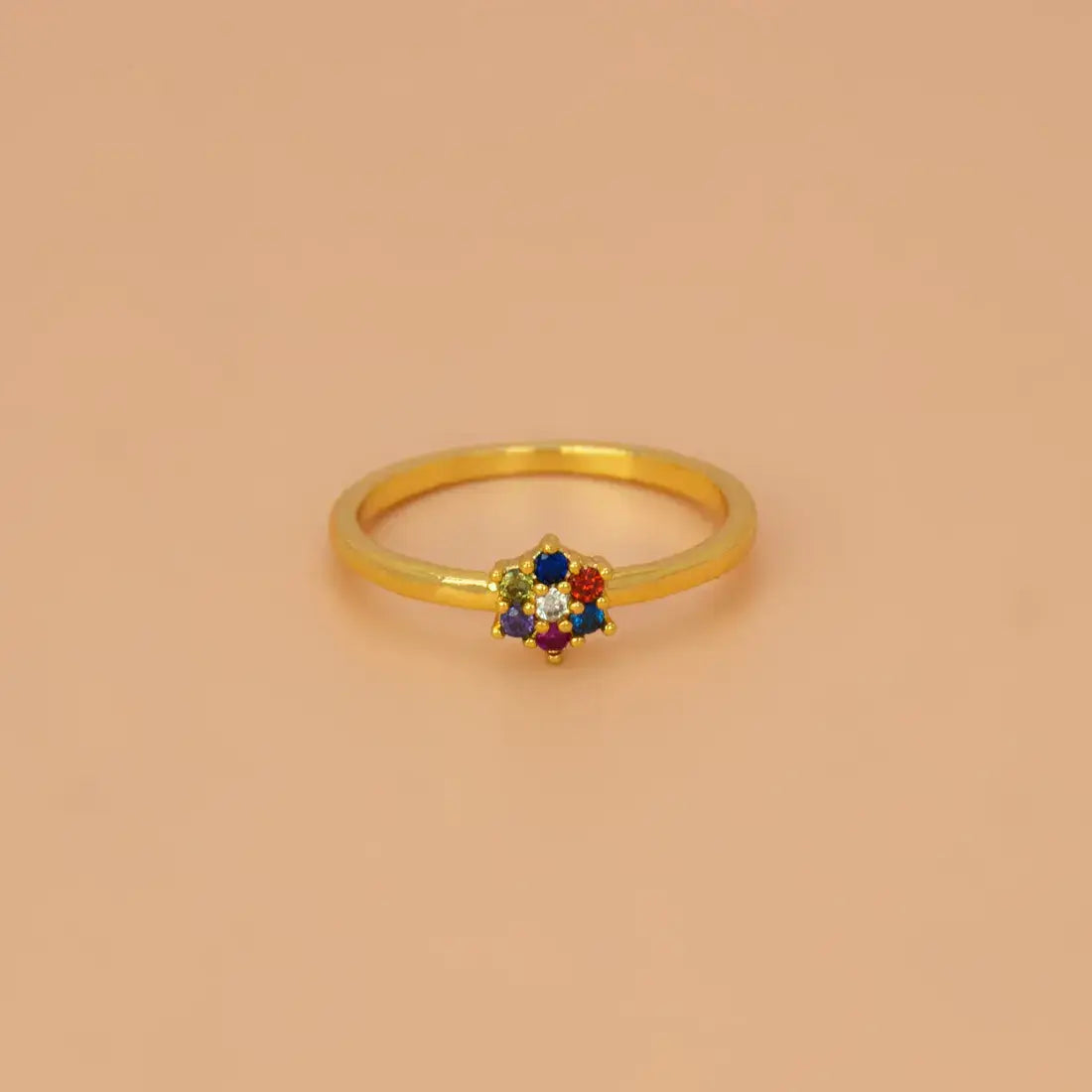 Saptaratna Floral Stone Gold Plated Ring featuring a cluster of seven vibrant stones in a gold-plated setting.