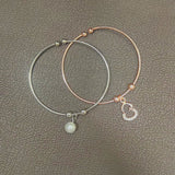 Silver_and_Rose-Gold-Plated_Pearl-_-Moon-Star-Set-Charm-Bangles