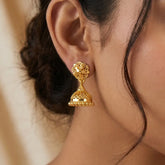 Simple Gold Foamed Jhumka Earrings worn by a model, showcasing intricate foam-work and elegant design.