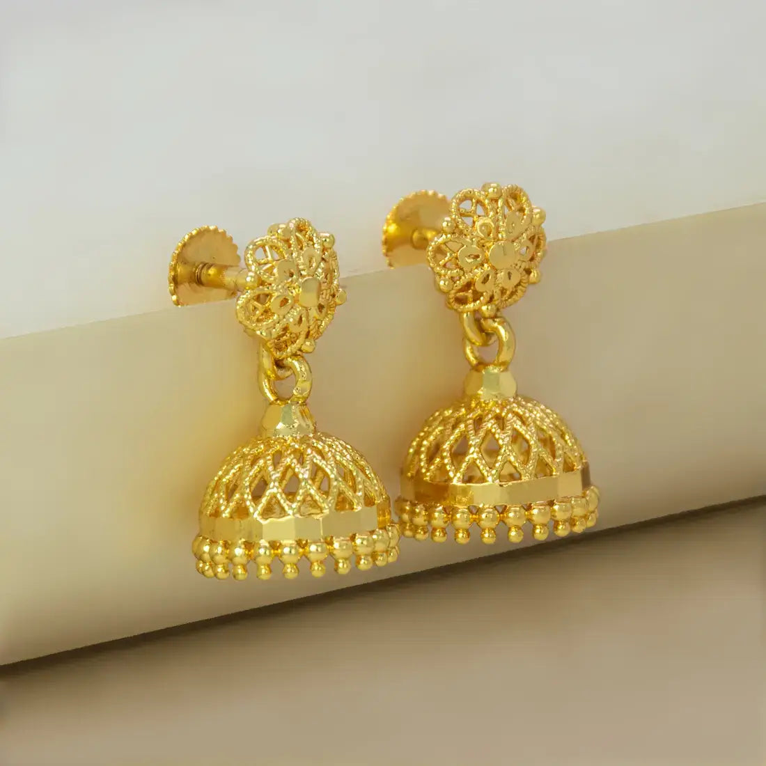 Net Design Gold Plated Filigree Jhumka Earrings showcasing intricate gold lattice design and traditional craftsmanship.