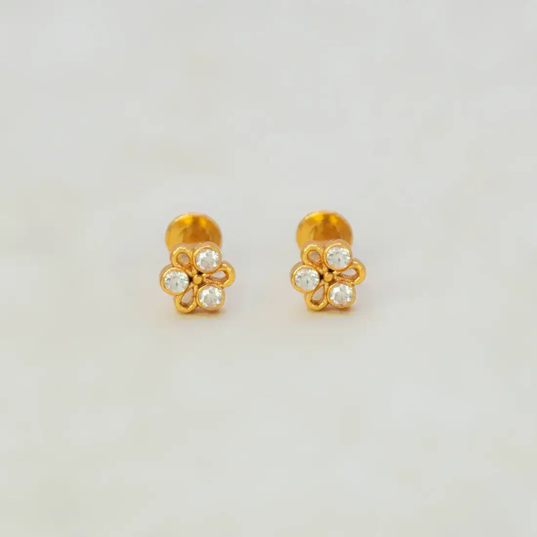 Simple Stone Flower Studs for Second Lobe Nose & Kids with gold plating and sparkling stones.