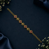 Gold Plated Stones and Outline Heart Bracelet featuring alternating heart links set with sparkling stones.