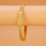 Exquisite Textured Mesh Design Kada Bangle showcasing intricate gold detailing on a smooth background.