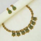 Victorian Antique Emerald Stone Necklace Set with chandbali-inspired pendants and earrings, showcasing emerald stones.