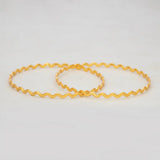 Unique Gold Plated Zigzag Bangles showcasing a bold, undulating design with micro-bead texture.
