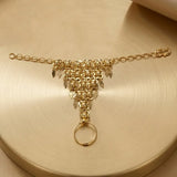 Alluring Gold Plated Finger Ring Set For Kids featuring elegant decorative elements on a golden chain.