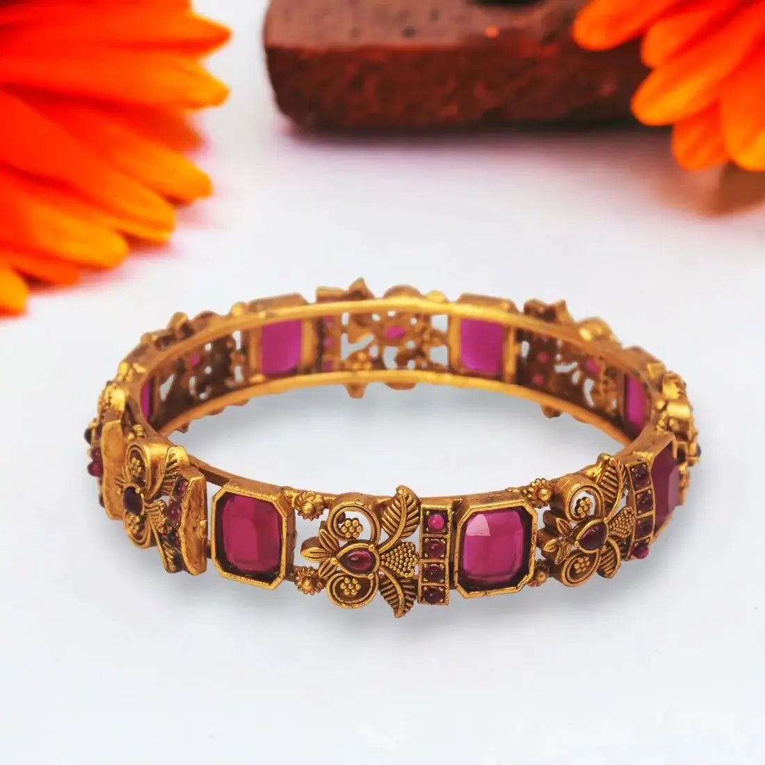 Antique Leaf Design Gold Plated Ruby Bangle Kada for women with floral motifs and square ruby stones