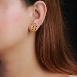 Alluring Gold Plated Floral Ruby Stud Earrings
