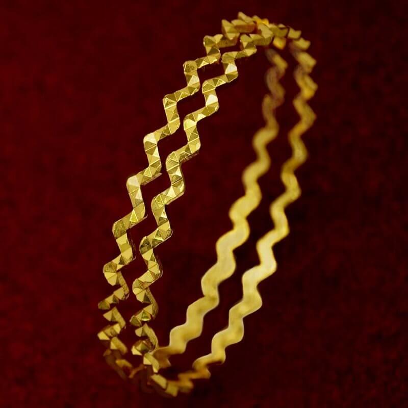 Daily wear Designer Gold Plated Zigzag Bangles showcasing an elegant zigzag design in gold plating.