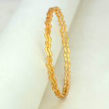 Delicate Gold Plated Wave Pattern Bangles featuring an elegant wave design, perfect for any occasion.
