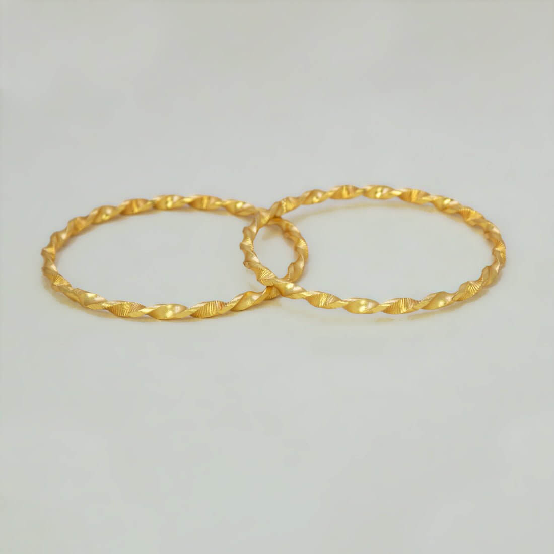Elegant Gold Foamed Designer Spiral Bangles - K Supreme