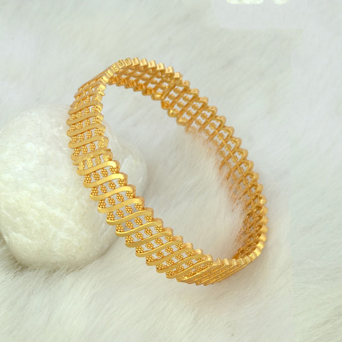 Elegant Gold Plated Floral Designer Bangle for Women on a soft background, perfect for daily wear.