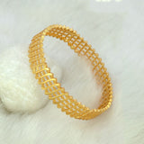 Elegant Gold Plated Floral Designer Bangle for Women on a soft background, perfect for daily wear.