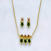 Elegant Gold Plated Green Nagapadam Pendant Necklace with matching earrings, perfect for festive occasions.