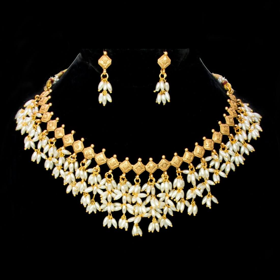 Exquisite Gold Plated Pearl Hanging Choker Necklace Set with dangling pearls and matching earrings.