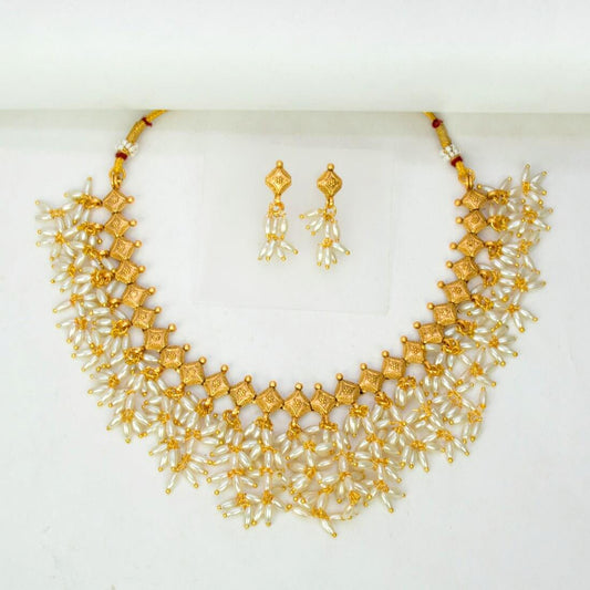 Exquisite Gold Plated Pearl Hanging Choker Necklace Set featuring gold accents and dangle pearls, perfect for formal occasions.