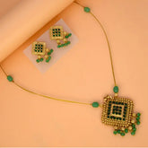 Fashion Invisible Chain Antique Green Stone Pendant Set featuring a necklace and matching earrings with green stones.