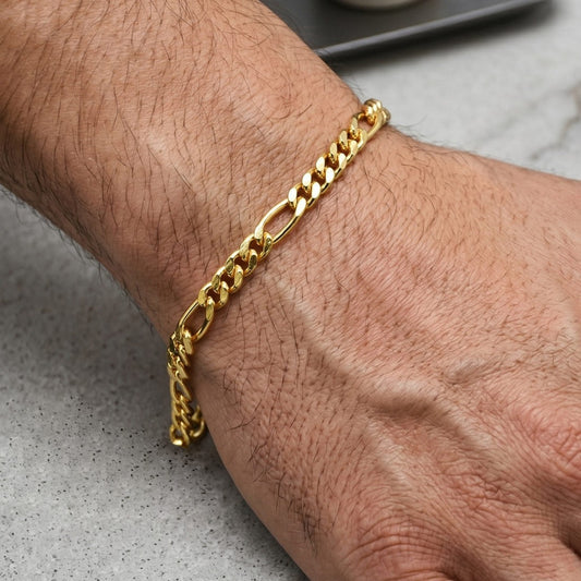 K Supreme gold plated brass figaro chain bracelet for men and women, 4mm width, S hook closure, high polish finish.