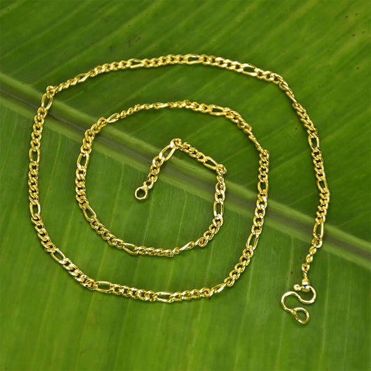 One Gram Gold Trendy Thin Figaro Unisex Sachin Chain showcased on a green leaf background.