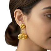 South Indian Gold Plated Umbrella Jhumka Earrings worn by a model showcasing elegant design and lightweight appeal.