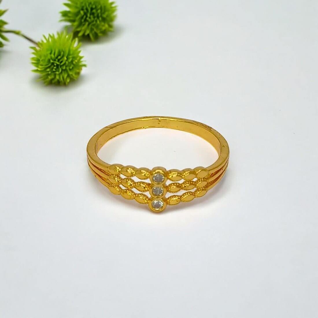 Stunning Gold Plated CZ Stone Triple Band Ring showcasing a luxurious design with white CZ stones.