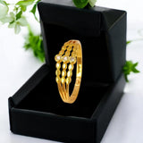 Stunning Gold Plated CZ Stone Triple Band Ring displayed in a black gift box, perfect for elegant occasions.