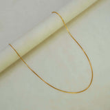 Aesthetic Gold Plated Thin Box Chain For Women displayed elegantly against a light background.