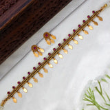 Antique Gold Plated Curb Link Elakkathali Choker Set with gold leaf danglers and ruby-toned kemp stones.