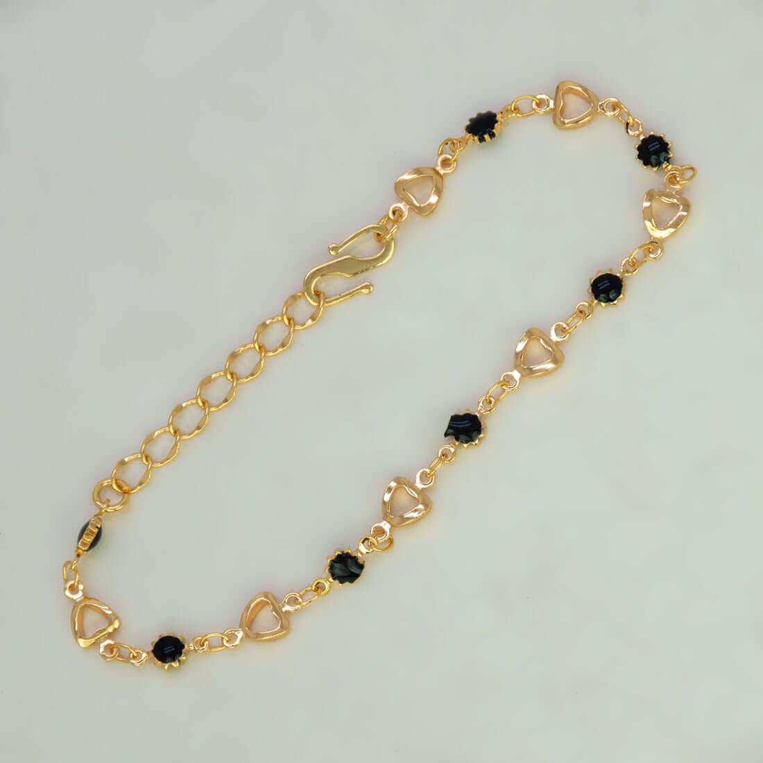 Dainty Black Enamel Flower & Golden Heart Bracelet