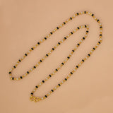 Gold Plated Black and White Pearl Chain Necklace for Women on a light background.