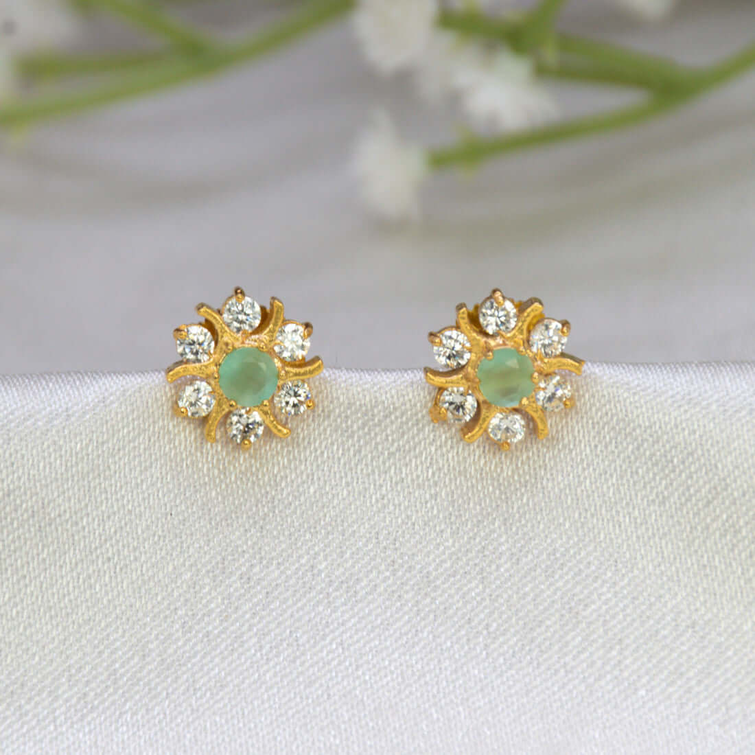 Gold Plated Pastel Central Stone CZ Flower Studs featuring mint green center stone and sparkling white accents.
