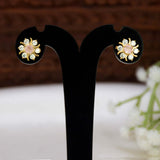 Gold Plated Pastel Central Stone CZ Flower Studs displayed on an earring stand, featuring a pink center stone and sparkling accents.