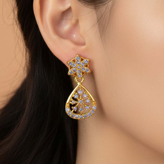 Dazzling Gold Plated Floral Purple CZ Stone Drop Earrings worn by a person