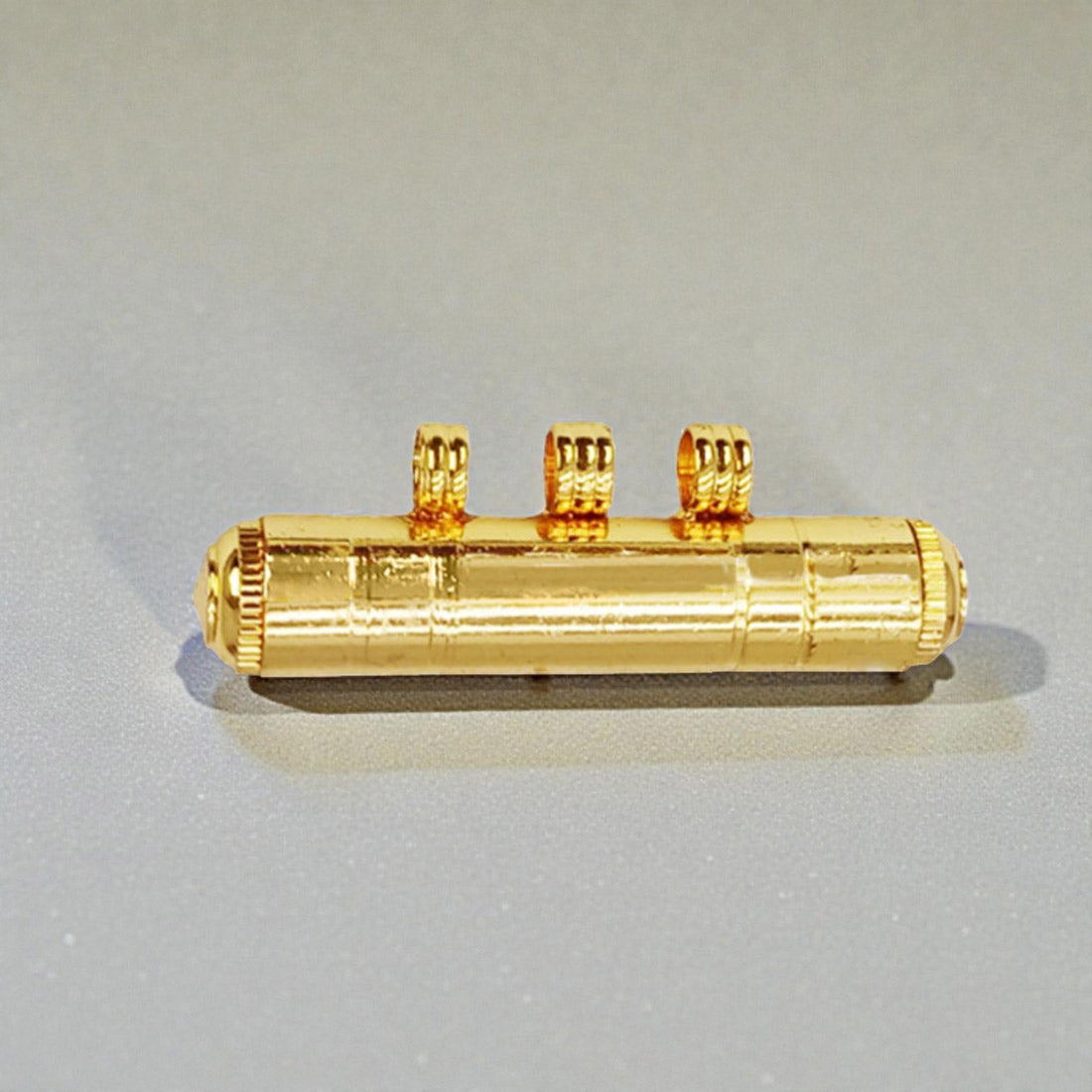 Elegant Cylindrical Gold Plated Amulet