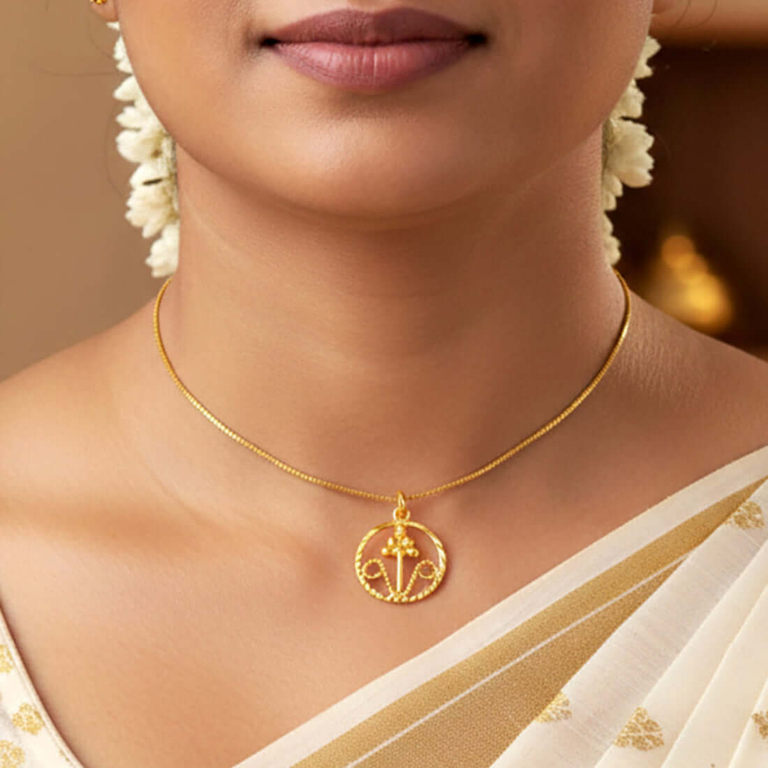 Simple Gold-Plated Floral Pendant With Chain worn elegantly with a saree underneath flowers.