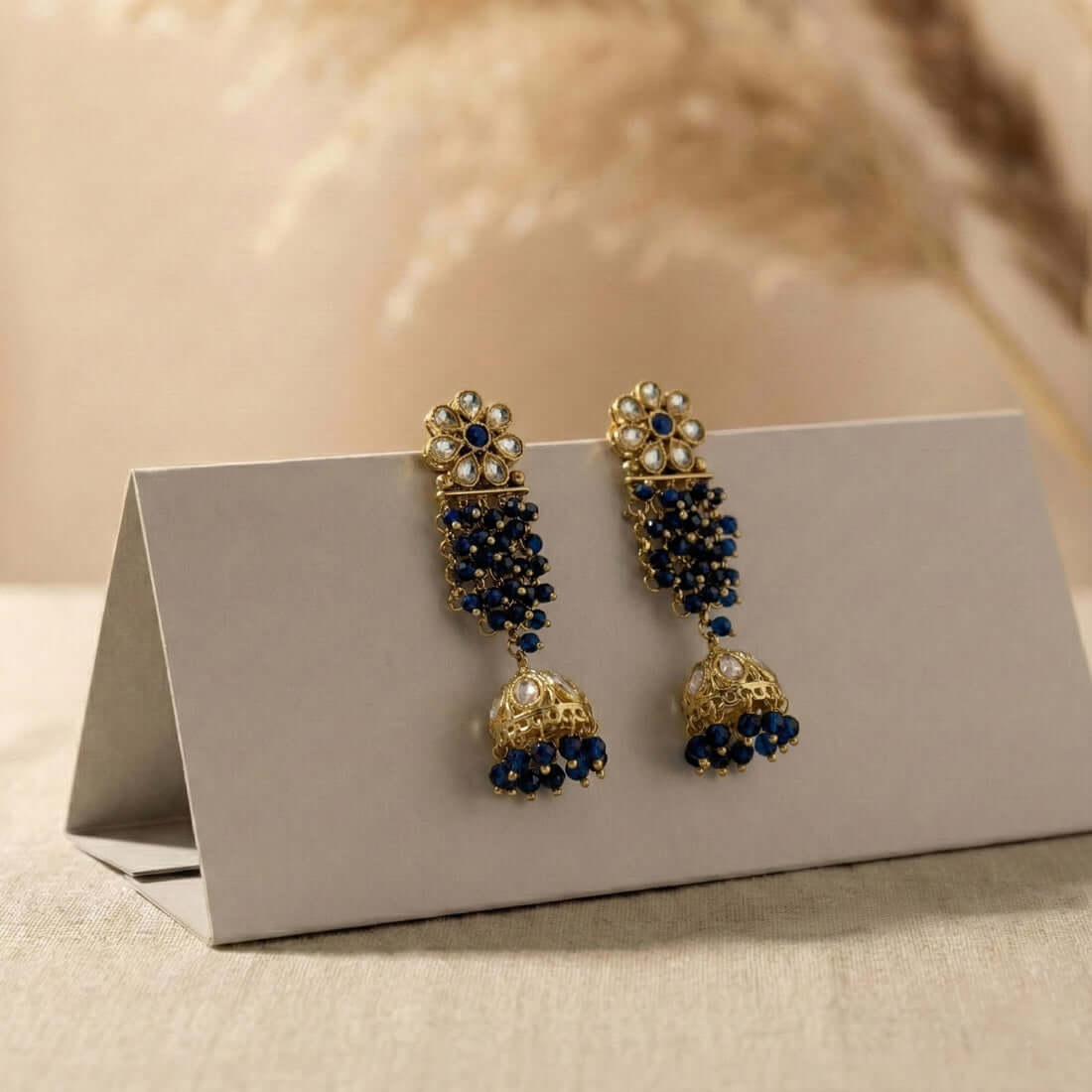 Gold-Plated-Floral-Kundan-Navy-Blue-Jhumka-Earrings
