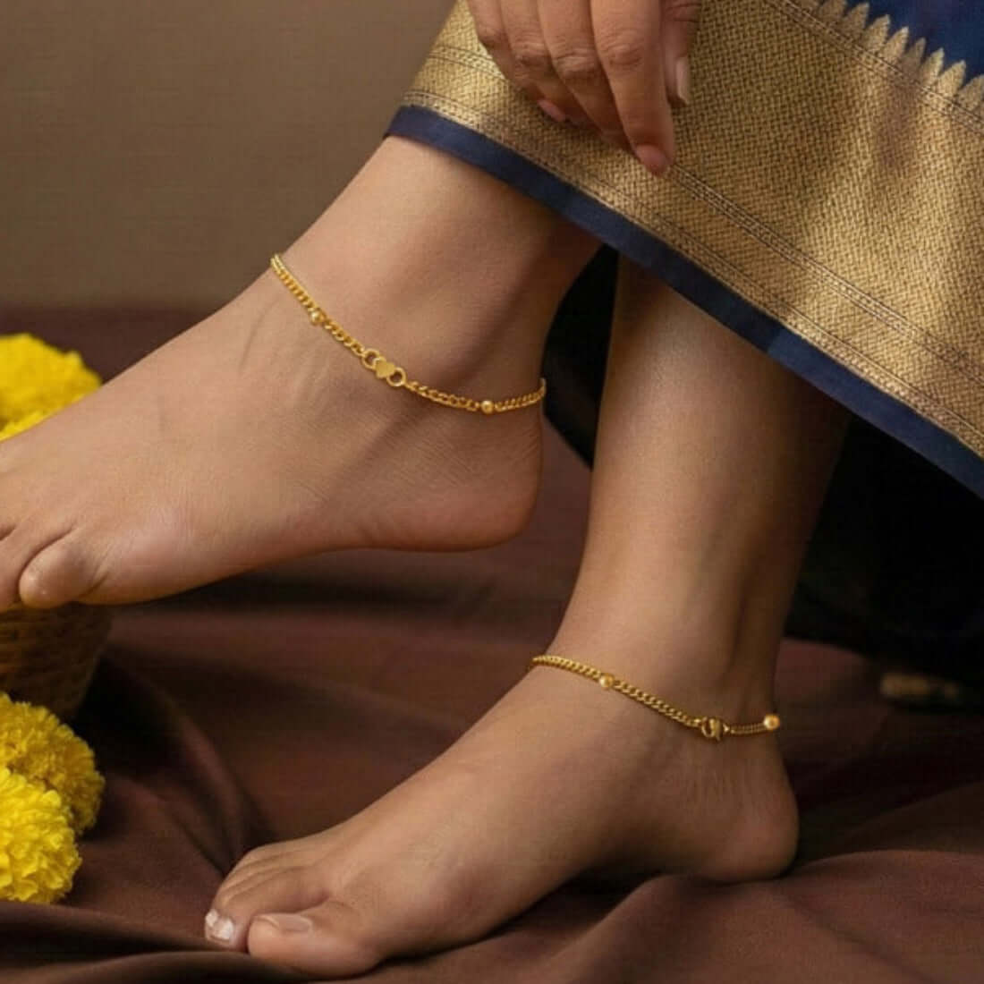 Trendy Gold-Plated Beaded Curb Link Chain Anklets on a girl's ankle
